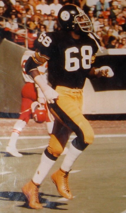 L.C. Greenwood Gold Shoes