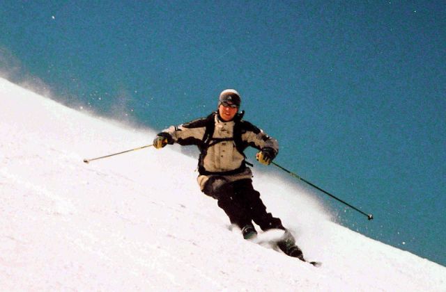 Skier carving a turn