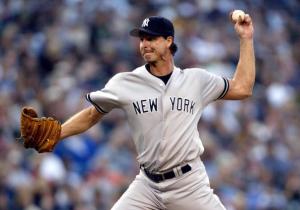 SEATTLE - AUGUST 24:  Starting pitcher Randy Johnson #41 of the New York Yankees throws against the Seattle Mariners August 24, 2006 at Safeco Field in Seattle Washington. (Photo by Otto Greule Jr/Getty Images)