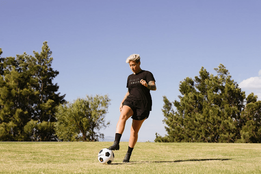 woman playing soccer